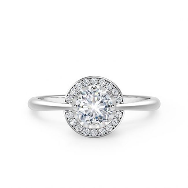 Необычноое кольцо с круглым белым бриллиантом в ореоле