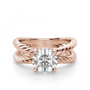 Переплетеное кольцо из розового золота с бриллиантом