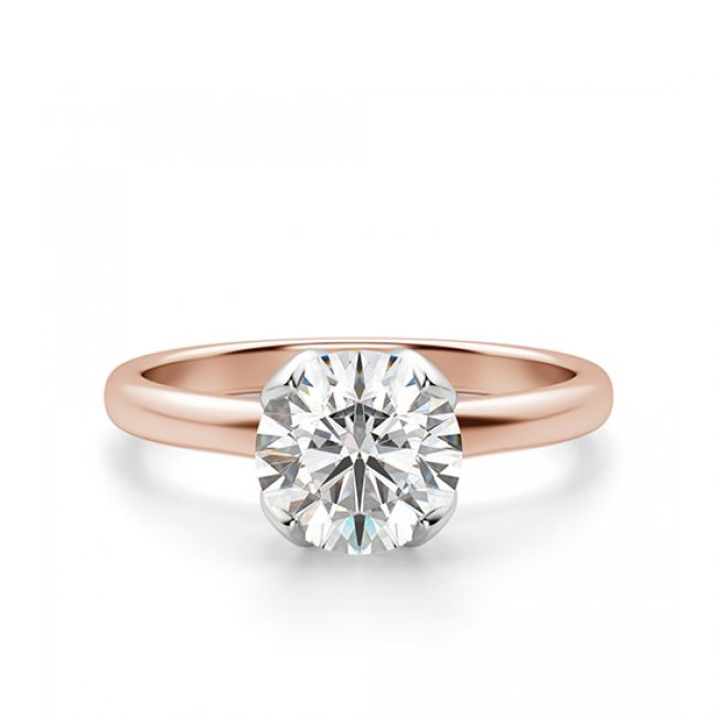 Кольцо с бриллиантом в лепестках из розовое золота